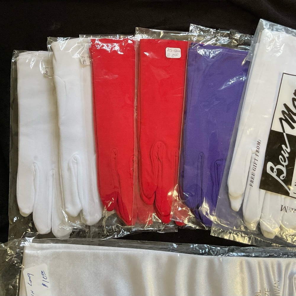 END RUN (11) Pair Gloves: White, Red, Silver and Purple Gloves.